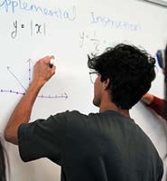 Student at whiteboard